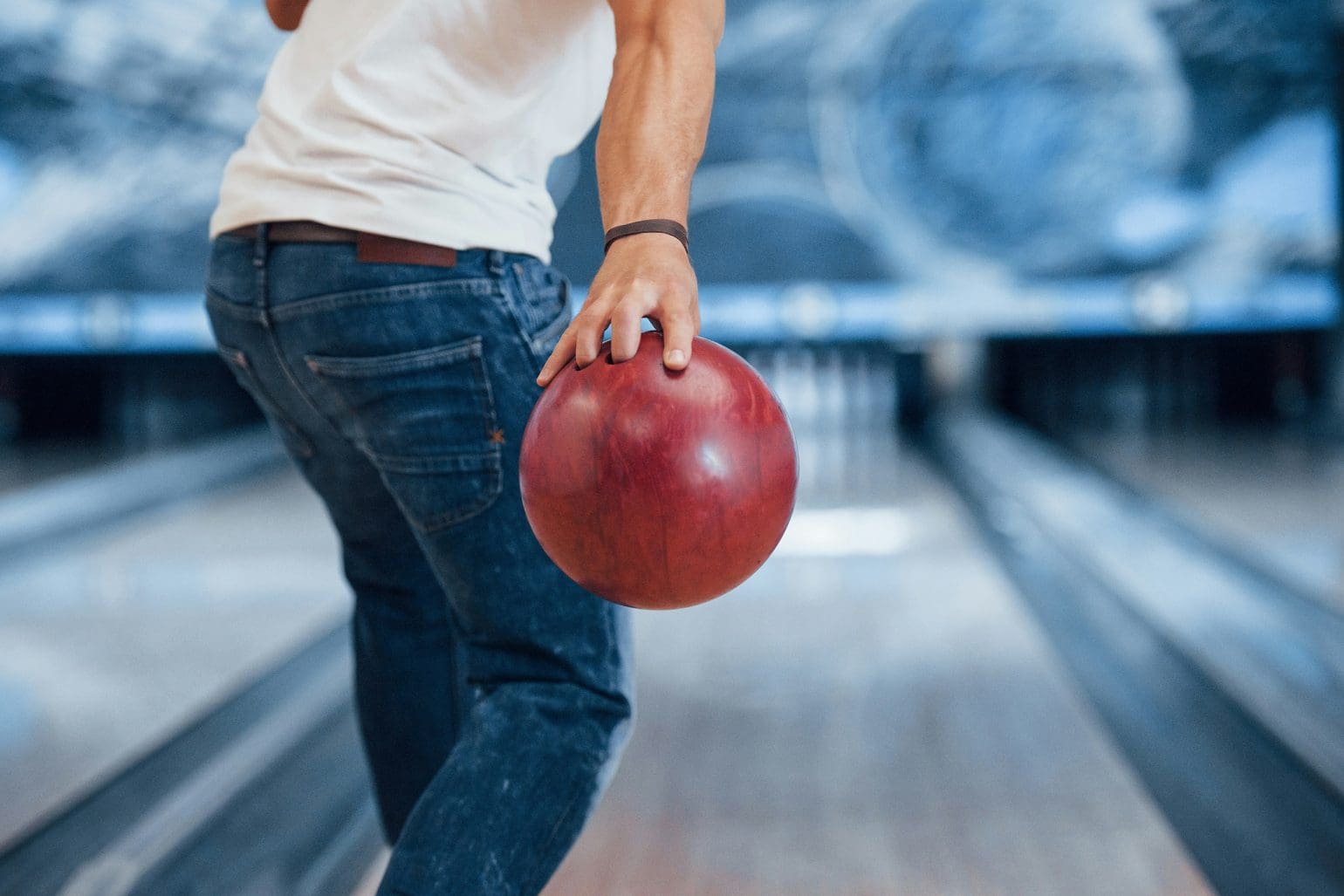 person holding a bowling ball