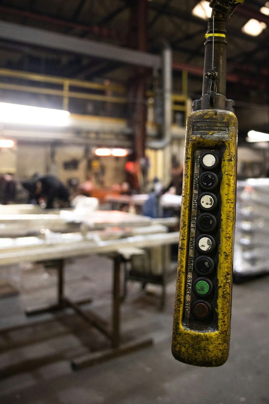 picture of control desk with workshop in the background