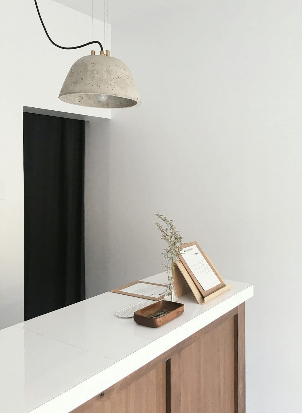 picture of a a bright and very white mini reception area