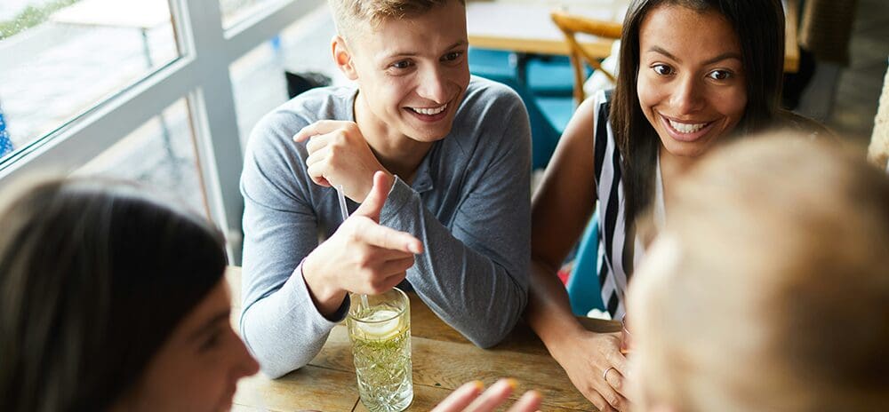 Happy guests enjoying a relaxed restaurant experience